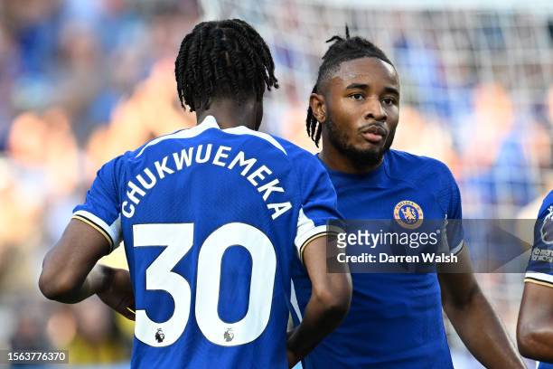 Christopher Nkunku of Chelsea celebrates a goal with Carney Chukwuemeka during the first half of the pre season friendly match against the Brighton &...