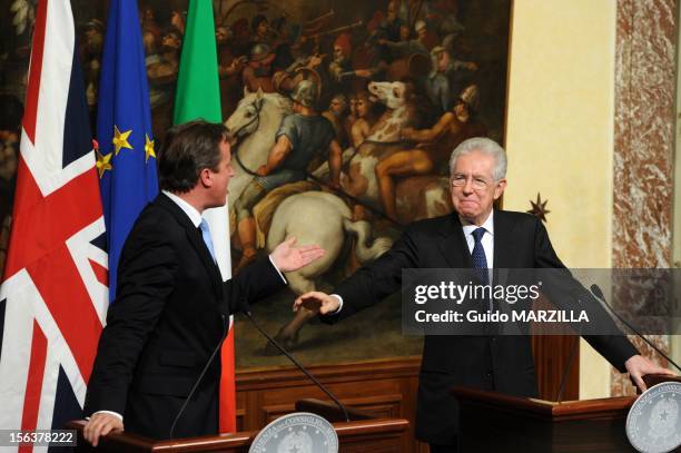 Italian Prime Minister Mario Monti meets British Prime Minister David Cameron at Palazzo Chigi on November 13, 2012 in Rome, Italy. During the press...