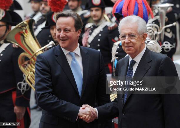 Italian Prime Minister Mario Monti meets British Prime Minister David Cameron at Palazzo Chigi on November 13, 2012 in Rome, Italy. After their...