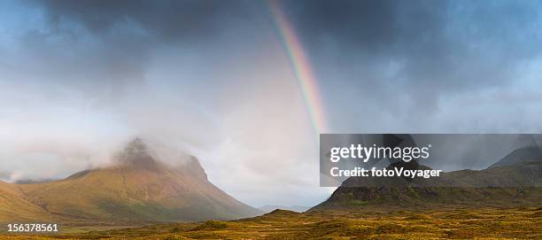 highland rainbow dramatic mountain landscape scotland - cuillins stockfoto's en -beelden