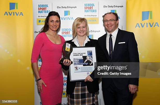 Sarah Storey and Barney Storey pose with Excellence in Disabled Sport winner Hannah Russell during the AVIVA and Daily Telegraph School Sport Matters...