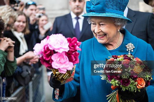 Queen Elizabeth II meets the crowd after her visit to the Royal Commonwealth Society on November 14, 2012 in London, England.