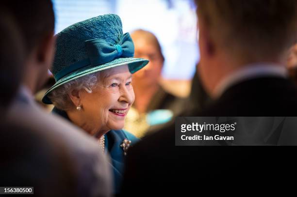 Queen Elizabeth II meets with guests during her visit to the Royal Commonwealth Society on November 14, 2012 in London, England.