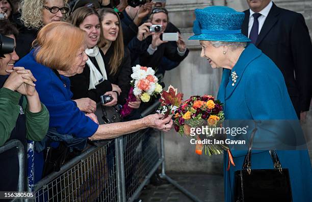 Queen Elizabeth II meets the crowd after her visit to the Royal Commonwealth Society on November 14, 2012 in London, England.