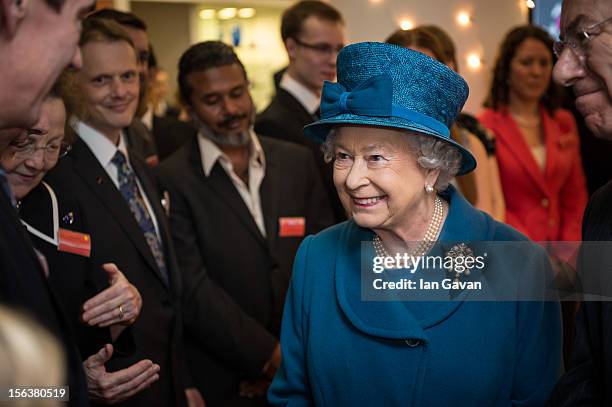 Queen Elizabeth II meets with guests during her visit to the Royal Commonwealth Society on November 14, 2012 in London, England.