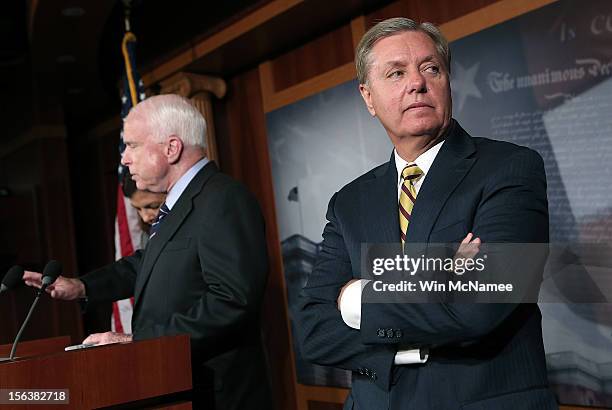 Sen. John McCain and Sen. Lindsey Graham hold a news conference on the Benghazi terrorist attack at the U.S. Capitol November 14, 2012 in Washington,...