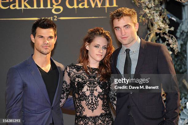 Taylor Lautner, Kristen Stewart and Robert Pattinson attends the UK Premiere of 'The Twilight Saga: Breaking Dawn Part 2' at Odeon Leicester Square...