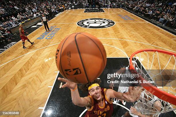 Anderson Varejao of the Cleveland Cavaliers drives to the basket against the Brooklyn Netson November 13, 2012 at the Barclays Center in the Brooklyn...