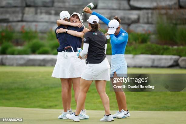 Maria Fassi of Mexico and Emma Talley of the United States celebrate with the champions Cheyenne Knight of the United States and Elizabeth Szokol of...