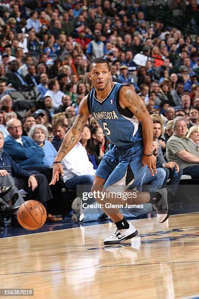 Will Conroy of the Minnesota Timberwolves handles the ball against the Dallas Mavericks on November 12, 2012 at the American Airlines Center in...