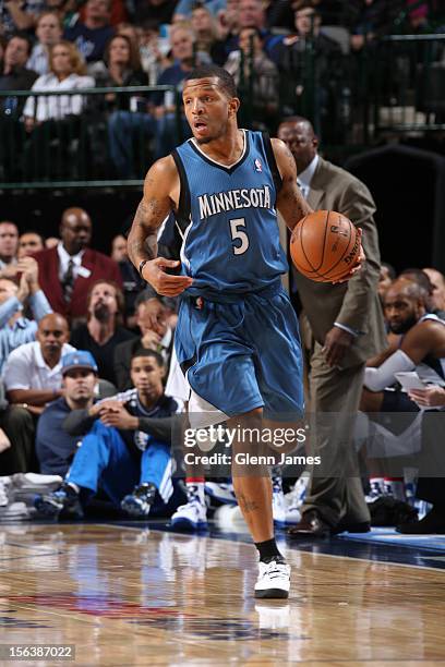 Will Conroy of the Minnesota Timberwolves handles the ball against the Dallas Mavericks on November 12, 2012 at the American Airlines Center in...