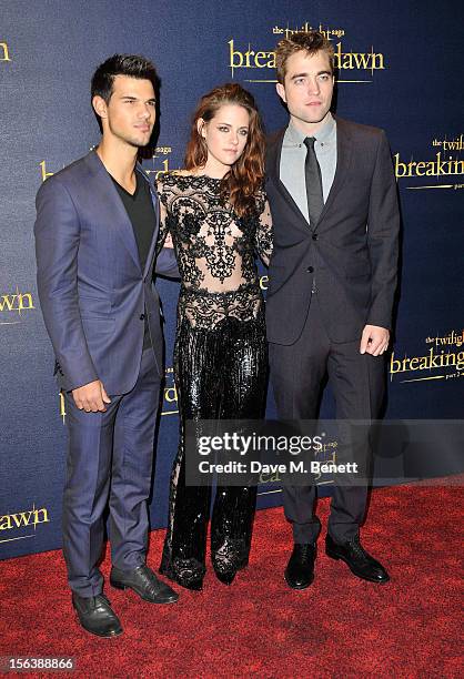 Taylor Lautner, Kristen Stewart and Robert Pattinson attends the UK Premiere of 'The Twilight Saga: Breaking Dawn Part 2' at Odeon Leicester Square...