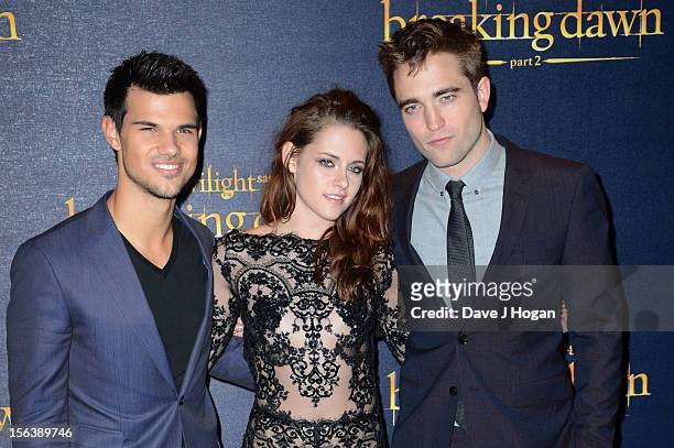 Taylor Lautner, Kristen Stewart and Robert Pattinson attend the UK Premiere of 'The Twilight Saga: Breaking Dawn - Part 2' at Odeon Leicester Square...