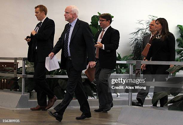 Senator John McCain on his way to attend a news conference at the U.S. Capitol November 14, 2012 on Capitol Hill in Washington, DC. Legislators on...