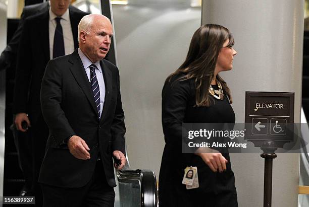 Senator John McCain leaves the U.S. Capitol after a news conference November 14, 2012 on Capitol Hill in Washington, DC. Legislators on Capitol Hill...