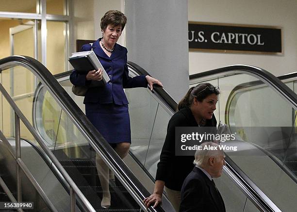 Senator and ranking member of the Senate Homeland Security and Governmental Affairs Committee Susan Collins walks down an escalator at the U.S....