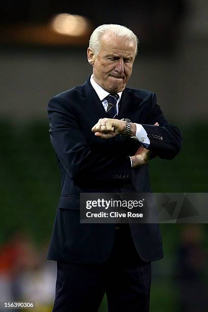 Giovanni Trapattoni of Ireland checks his watch during the International friendly between Ireland and Greece at the Aviva Stadium on November 14,...