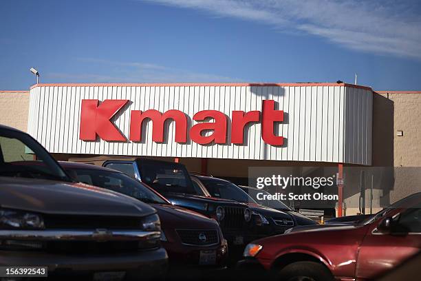 Cars sit in the parking lot of a Kmart store on November 14, 2012 in Chicago, Illinois. Sears Holdings , which owns Kmart, will report 3rd quarter...