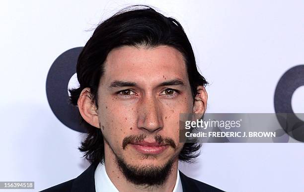 Adam Driver poses on arrival for the GQ Men of the Year Party at Chateau Marmont on Sunset Blvd., in Hollywood, California, on November 13, 2012. AFP...