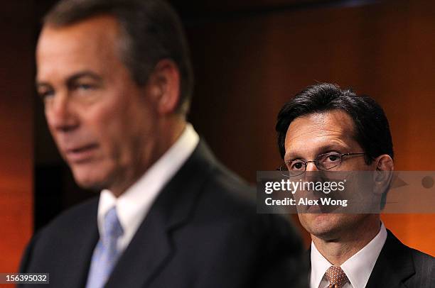 Speaker of the House Rep. John Boehner speaks as House Majority Leader Rep. Eric Cantor looks on during a news conference November 14, 2012 on...