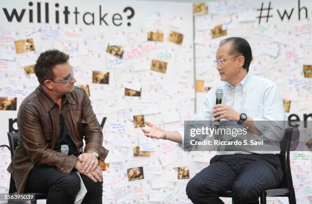 Bono and President of the World Bank Jim Yong Kim speaks at the World Bank on November 14, 2012 in Washington, DC.