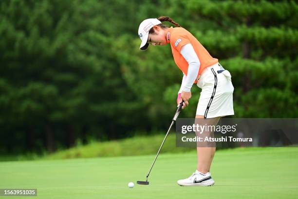 Shuri Sakuma of Japan holes the birdie putt on the 9th green during the rest of third round of DAITO KENTAKU eheyanet Ladies at the Queen's Hill Golf...