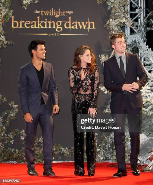 Actors Taylor Lautner, Kristen Stewart and Robert Pattinson attend the UK Premiere of 'The Twilight Saga: Breaking Dawn - Part 2' at Odeon Leicester...