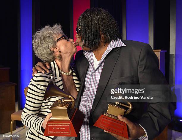 Singer/actress Rita Moreno and singer/songwriter Milton Nascimento kiss as they attend the 2012 Latin Recording Academy Special Awards during the...
