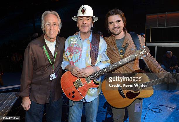 The Recording Academy President/CEO Neil Portnow, and recording artists Carlos Santana and Juanes appear onstage during rehearsals for the 13th...
