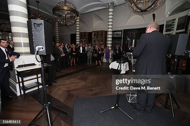 General view as guests show armed forces support at the 'Give Us Time' fundraiser held at Corinthia Hotel London on November 14, 2012 in London,...