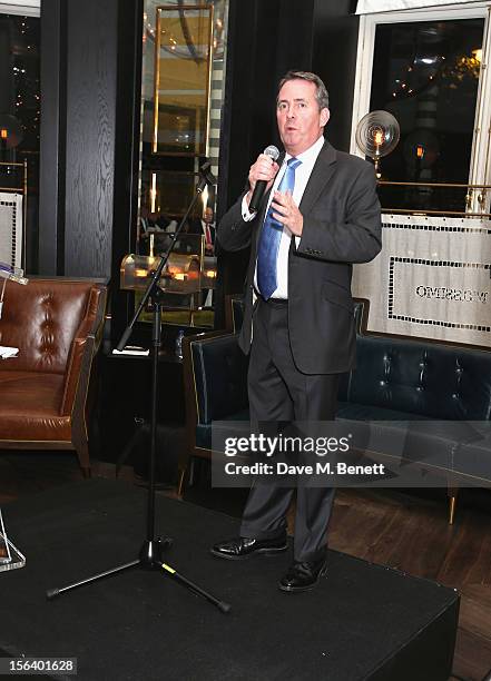 Dr. Liam Fox shows armed forces support at the 'Give Us Time' fundraiser held at Corinthia Hotel London on November 14, 2012 in London, England.
