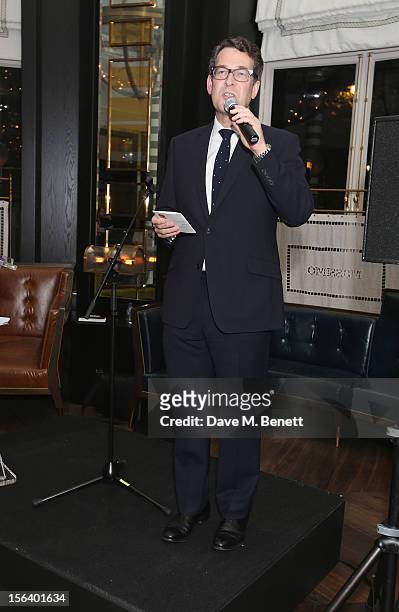 Matthew Dixon shows armed forces support at the 'Give Us Time' fundraiser held at Corinthia Hotel London on November 14, 2012 in London, England.