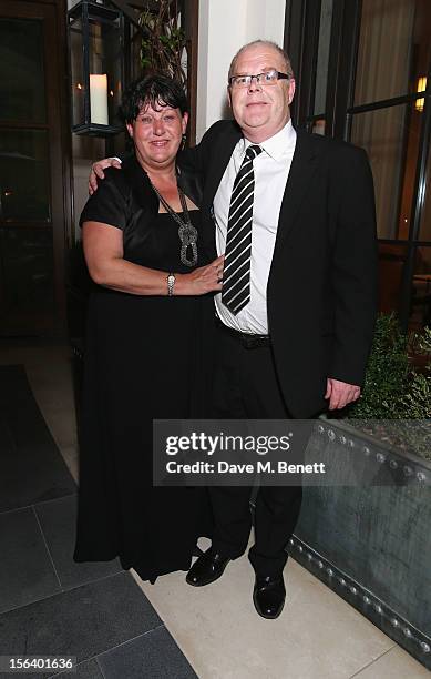 Denise Harris and Andy Harris show armed forces support at the 'Give Us Time' fundraiser held at Corinthia Hotel London on November 14, 2012 in...