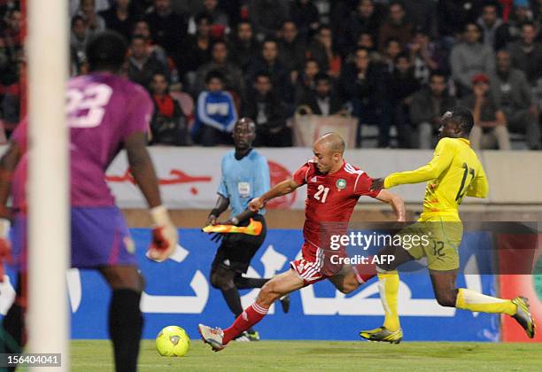 Morocco's Nordin Amrabet vies with Togo's Dokam Djene during the freindly match Morocco vs Togo in Casablanca on November 14, 2012 .AFP / PHOTO...