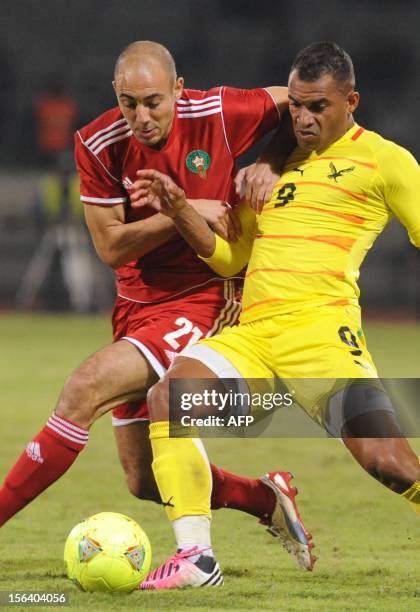 Morocco's Nordin Amrabet vies with Togo's Thomas Dossevi during the freindly match Morocco vs Togo in Casablanca on November 14, 2012 .AFP / PHOTO...