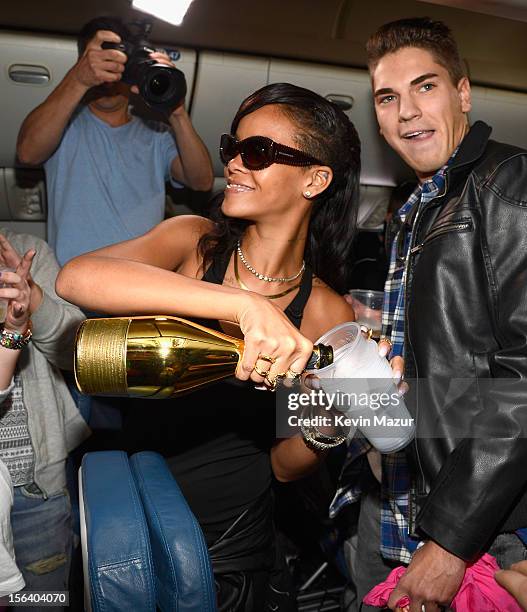 Rihanna celebrates with fans on the plane to her first stop on the 777 tour on November 14, 2012. Rihanna's 777 Tour - 7 countries, 7 days, 7 shows...