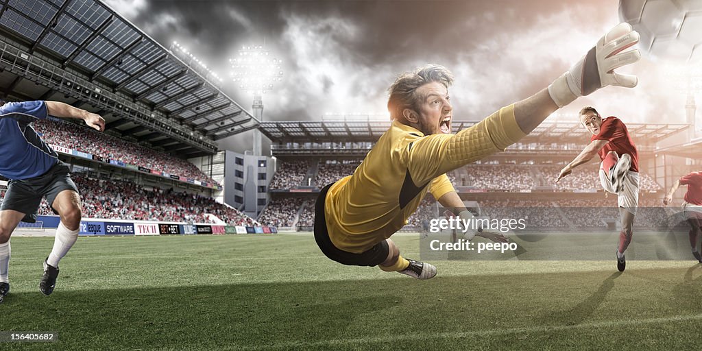 Goalkeeper Dives to Make Heroic Save