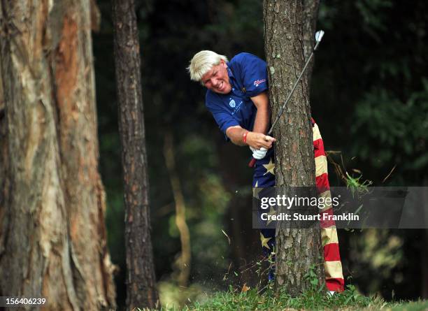 John Daly of USA plays a shot from the trees during the first round of the UBS Hong Kong open at The Hong Kong Golf Club on November 15, 2012 in Hong...