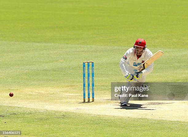 Phil Hughes of the Redbacks works the ball away during day four of the Sheffield Shield match between the Western Australia Warriors and the South...