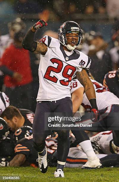 Glover Quin of the Houston Texans celebrates a turn-over against the Chicago Bears at Soldier Field on November 11, 2012 in Chicago, Illinois. The...