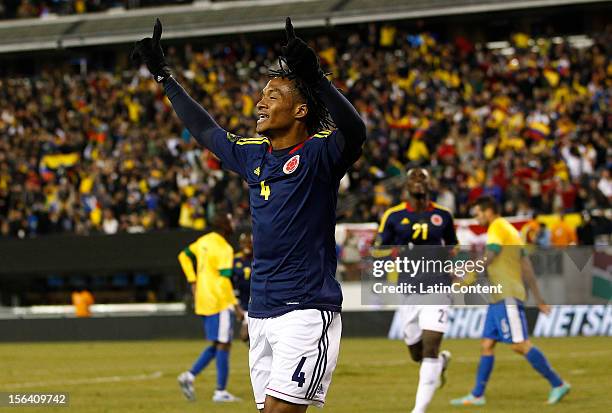 Juan Guillermo Cuadrado of Colombia celebrates a goal against Brazil during a FIFA Friendly match between Colombia and Brazil at the MetLife Stadium...