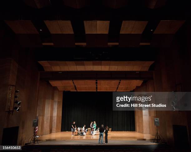 actors rehearsing on stage - auditoria stockfoto's en -beelden