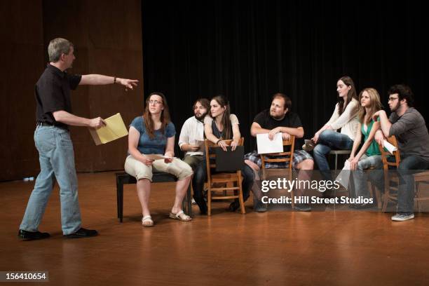 actors rehearsing on stage - actor (theater) stock pictures, royalty-free photos & images