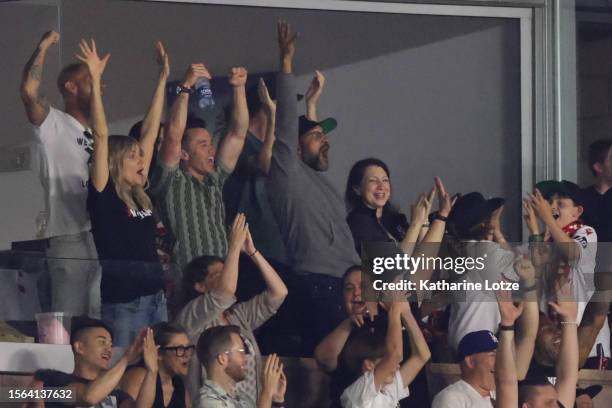 Kaitlin Olson, Rob McElhenney, Keegan-Michael Key and Elisa Key react during a pre-season friendly match between Wrexham AFC and the LA Galaxy II at...