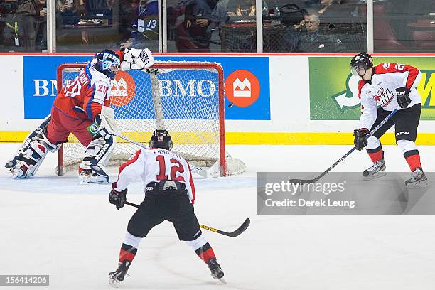 Andrei Makarov of team Russia defends the net against Curtis Lazar of the WHL All-Stars during Game One of the WHL-Russia Subway Super Series on...