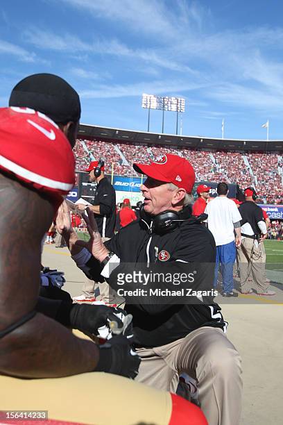 Linebackers Coach Jim Leavitt of the San Francisco 49ers talks with Patrick Willis during the game against the St. Louis Rams at Candlestick Park on...