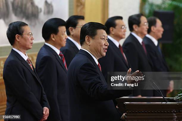 Chinese Vice President Xi Jinping , one of the members of new seven-seat Politburo Standing Committee, delivers a speech as Zhang Gaoli, Liu Yunshan,...