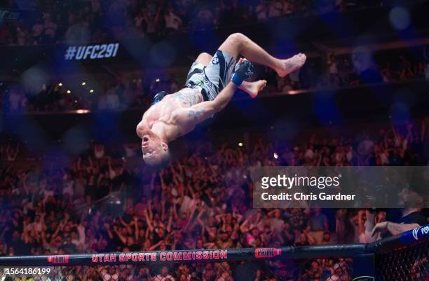 Justin Gaethje flips after beating Dustin Poirier during their BMF Title Lightweight fight at UFC 291 at the Delta Center July 29, 2023 at the in...