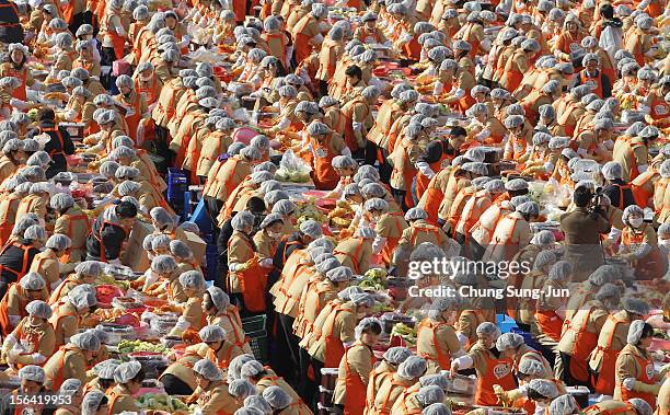 More than two thousand housewives make Kimchi for donation to the poor in preparation for winter in front of City Hall on November 15, 2012 in Seoul,...