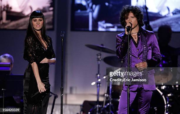 Singers Mala Rodriguez and Enrique Bunbury perform onstage during the 2012 Latin Recording Academy Person Of The Year honoring Caetano Veloso at the...